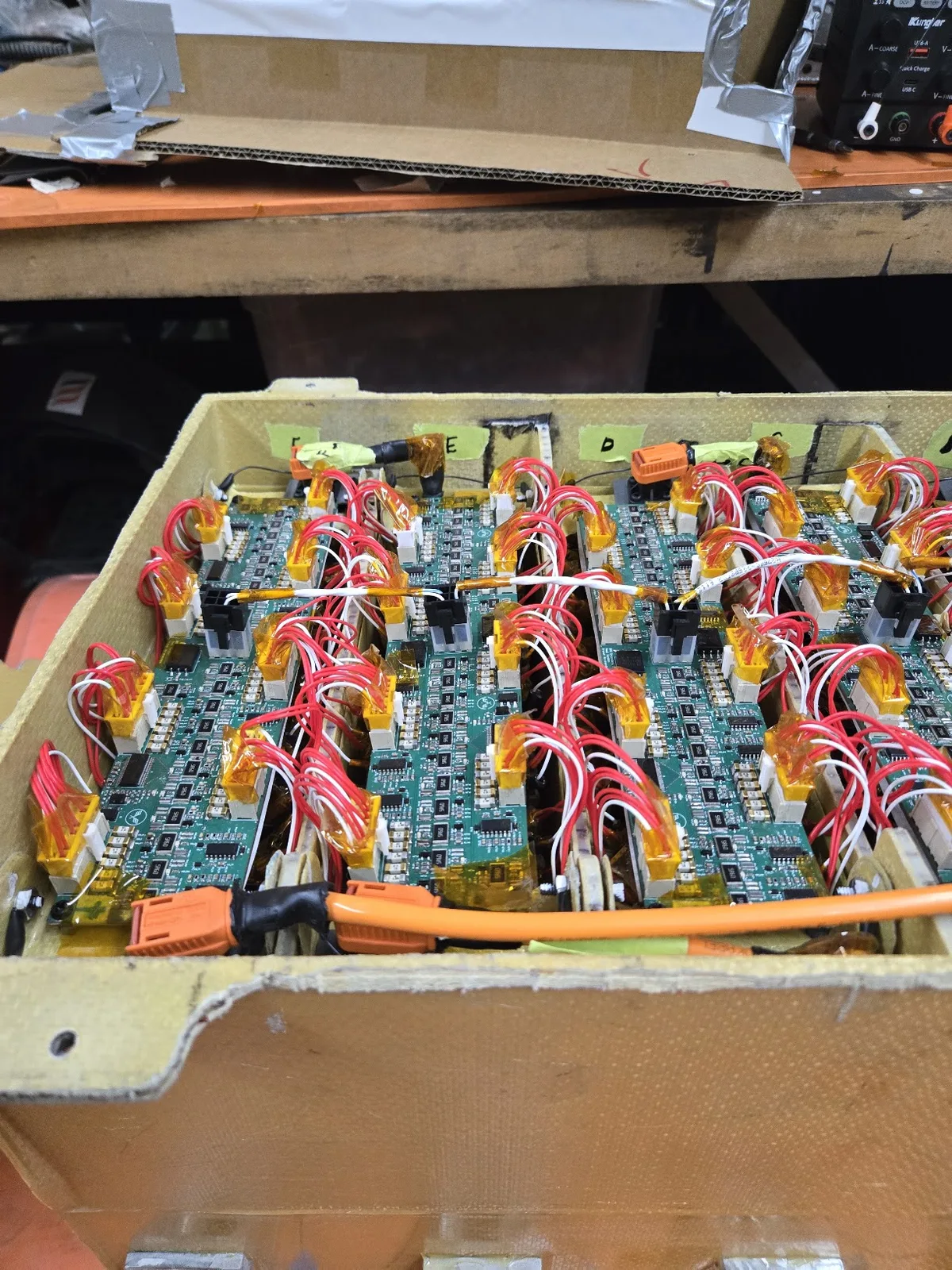IEM accumulator with twelve cell-monitoring boards and wiring